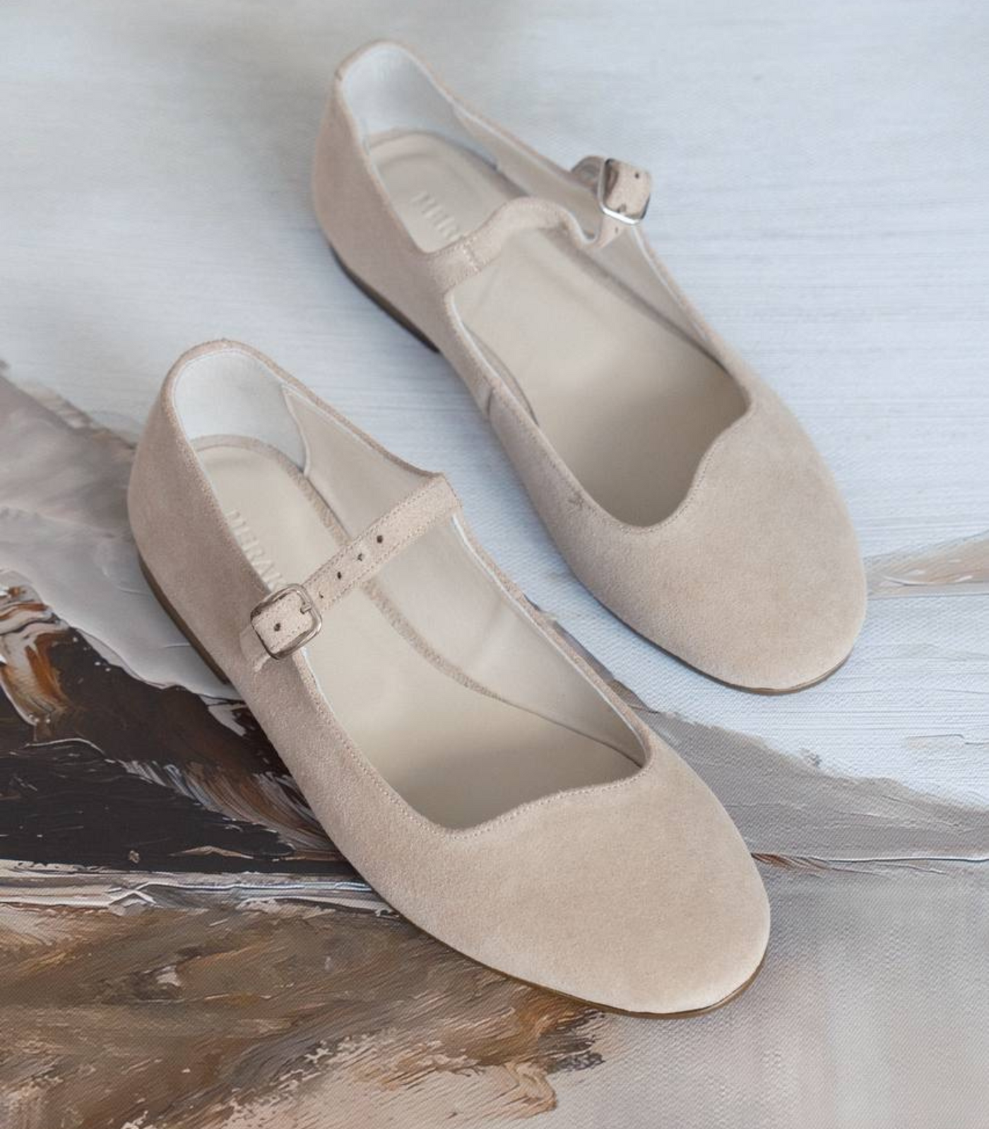 Creamy suede mary janes with wavy cut