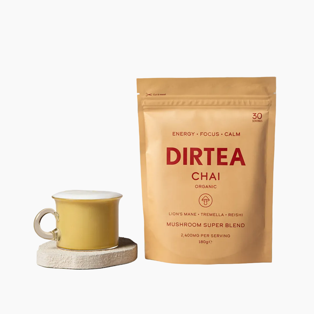 DIRTEA Chai package with a yellow mug on a beige background