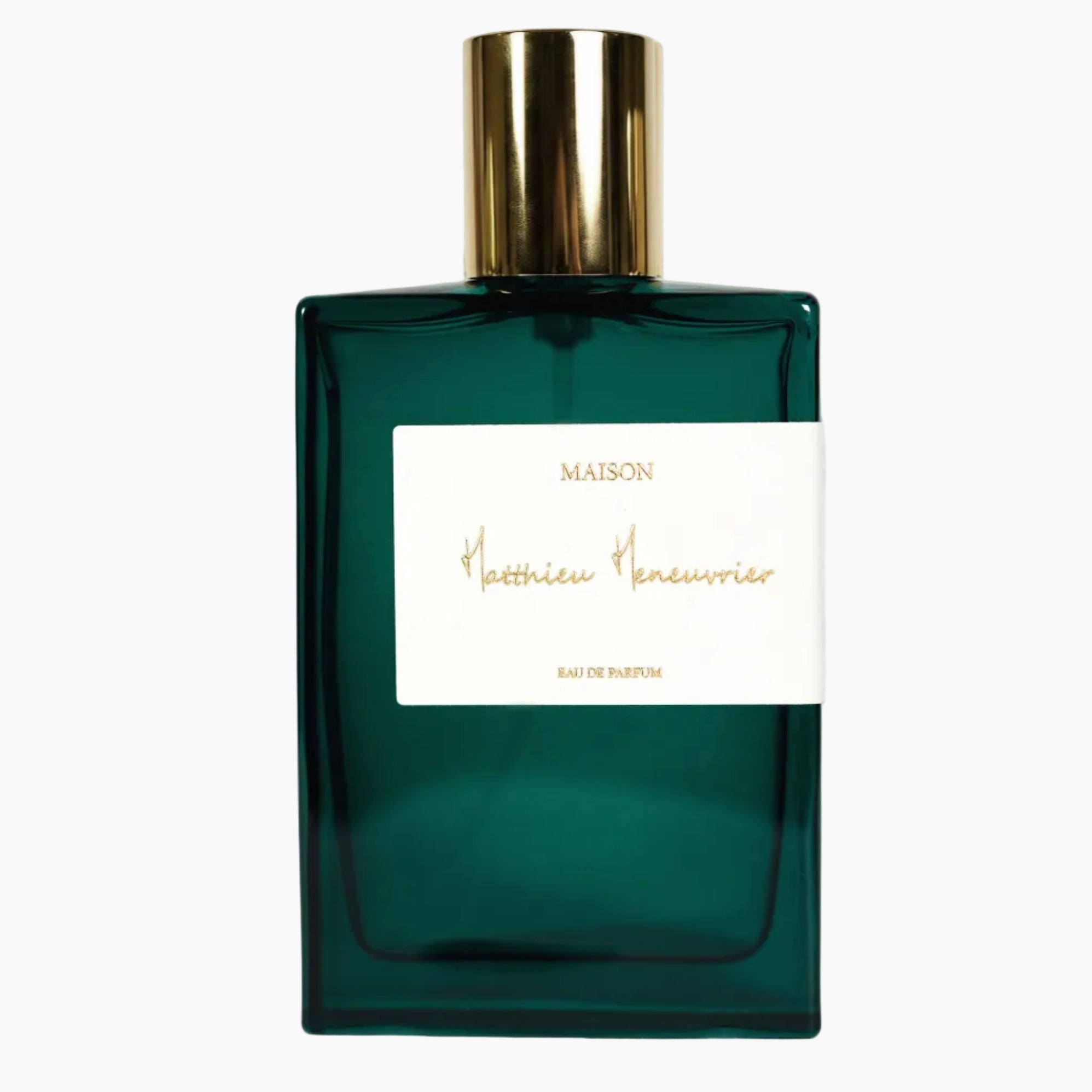 Green perfume bottle with gold cap on a white background