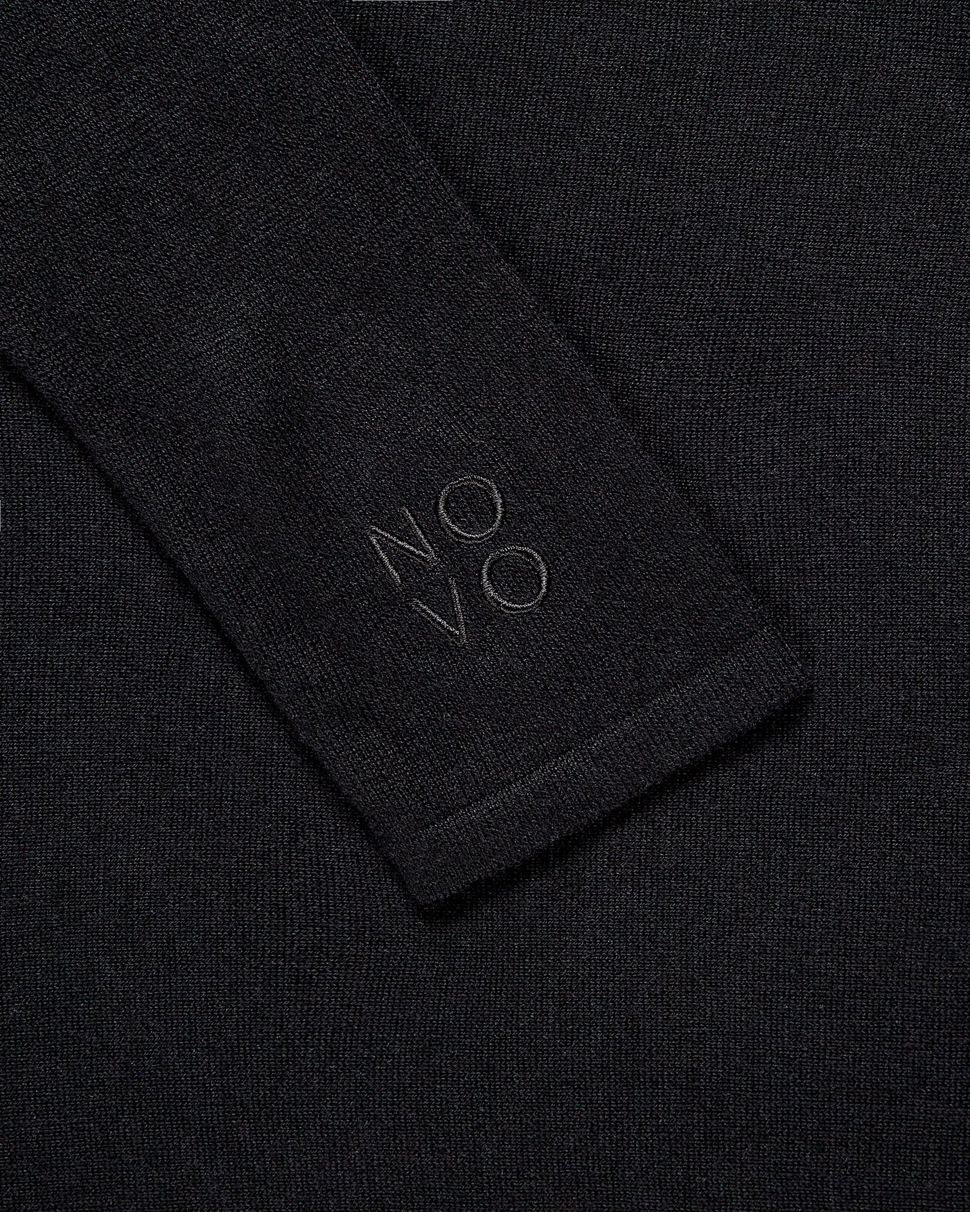 Embroided arm of Black Silk and Cashmere Bodysuit