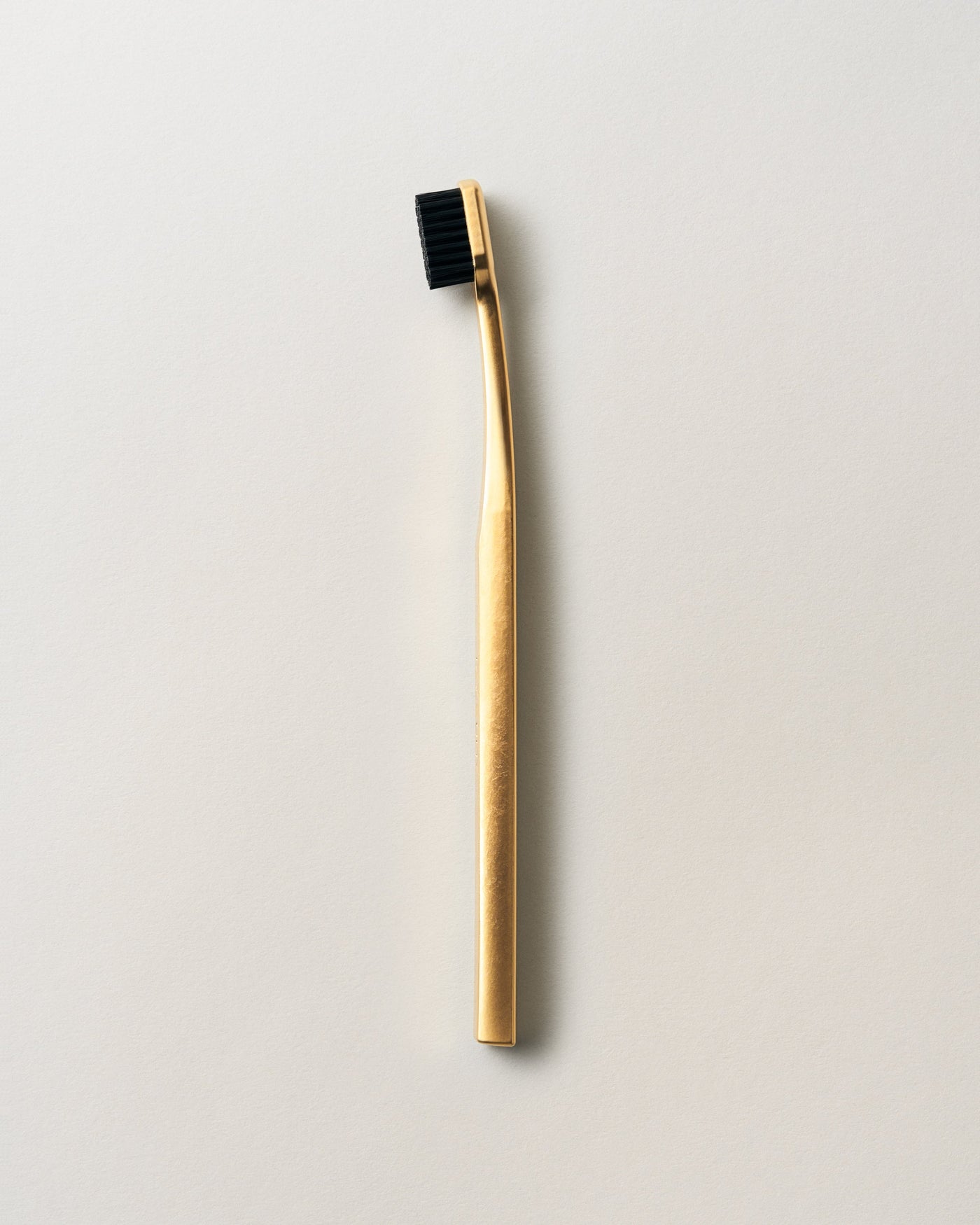 TOOTHBRUSH GOLD/BLACK