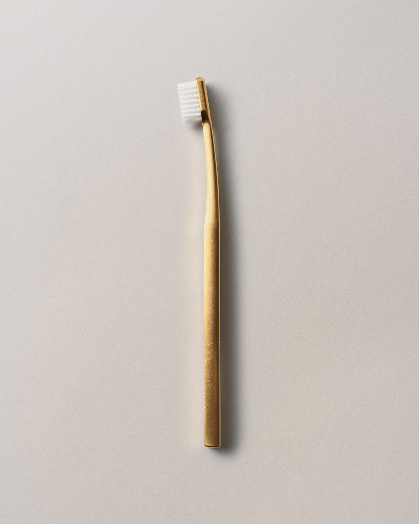 TOOTHBRUSH GOLD/WHITE