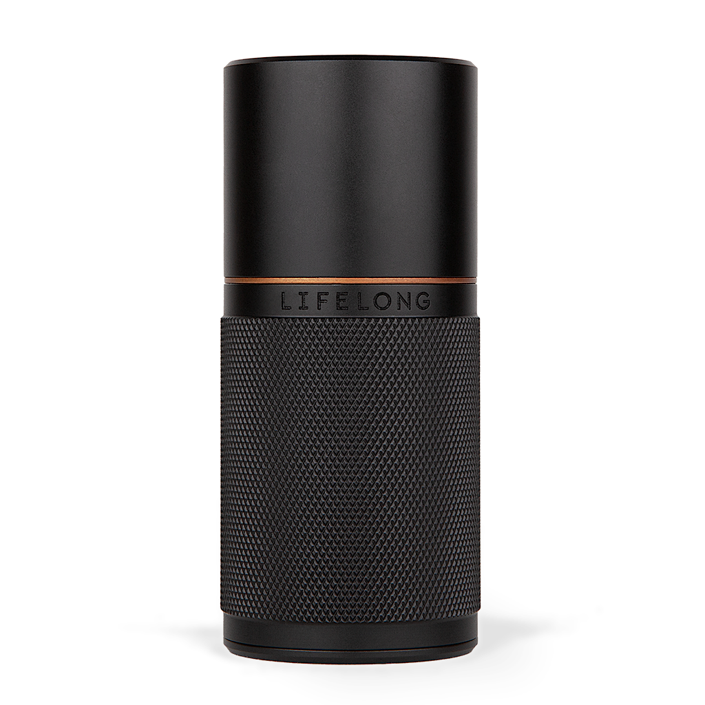 Dark refillable deodorant with knurled texture, small bronze details and a logo saying Lifelong in the middle.