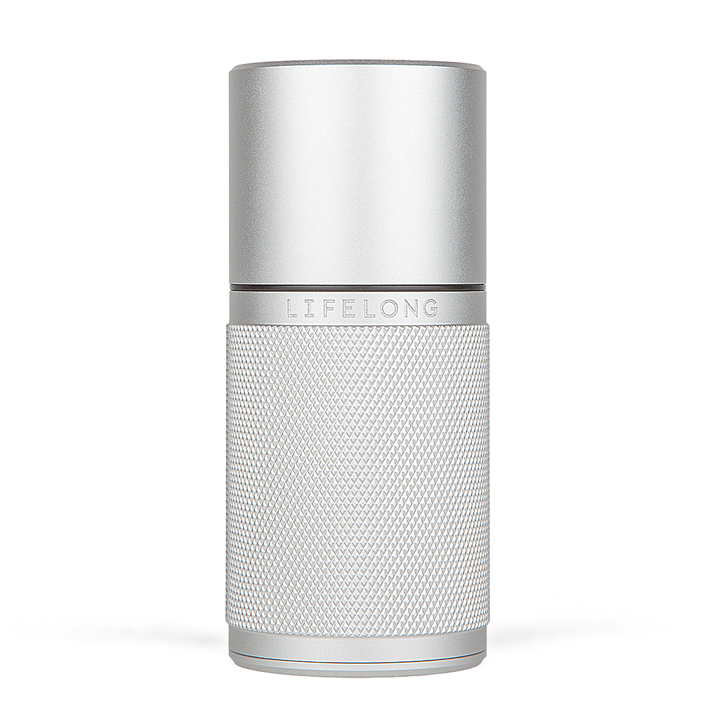 Silver-coloured refillable deodorant with knurled texture, small black details and a logo saying Lifelong in the middle.