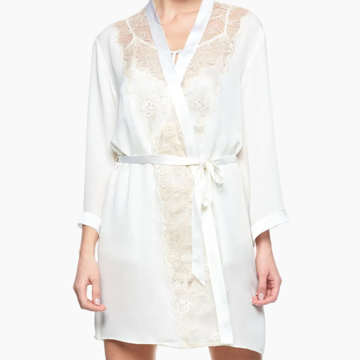 Model wearing a closed Cordelia silk bridal robe in pearl-white