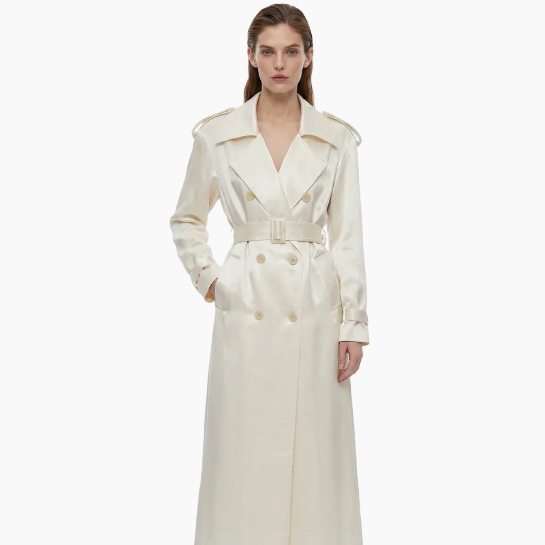Woman wearing a long white coat on a white background