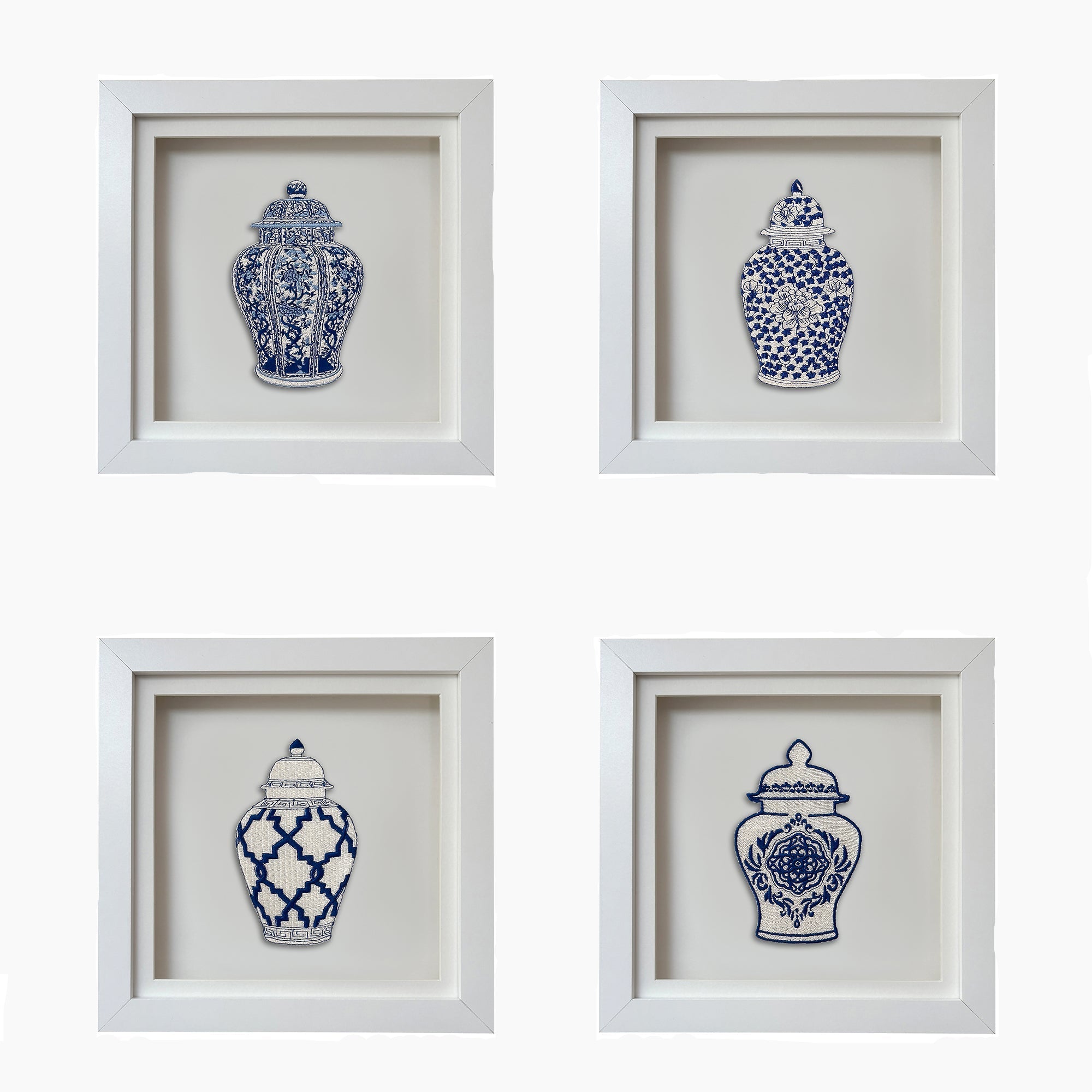 Four framed images of blue and white ceramic vases on a white background