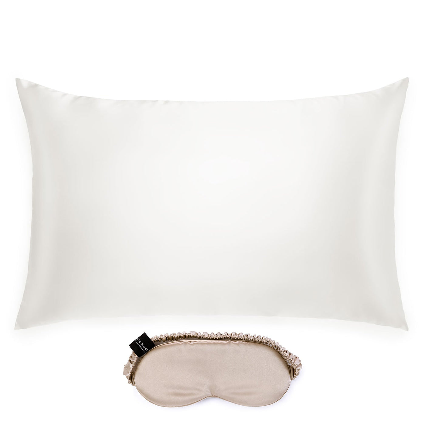 Silk Works ivory-coloured mulberry silk pillowcase and caramel coloured eye mask set, crafted from 22 momme silk for skin and hair benefits.